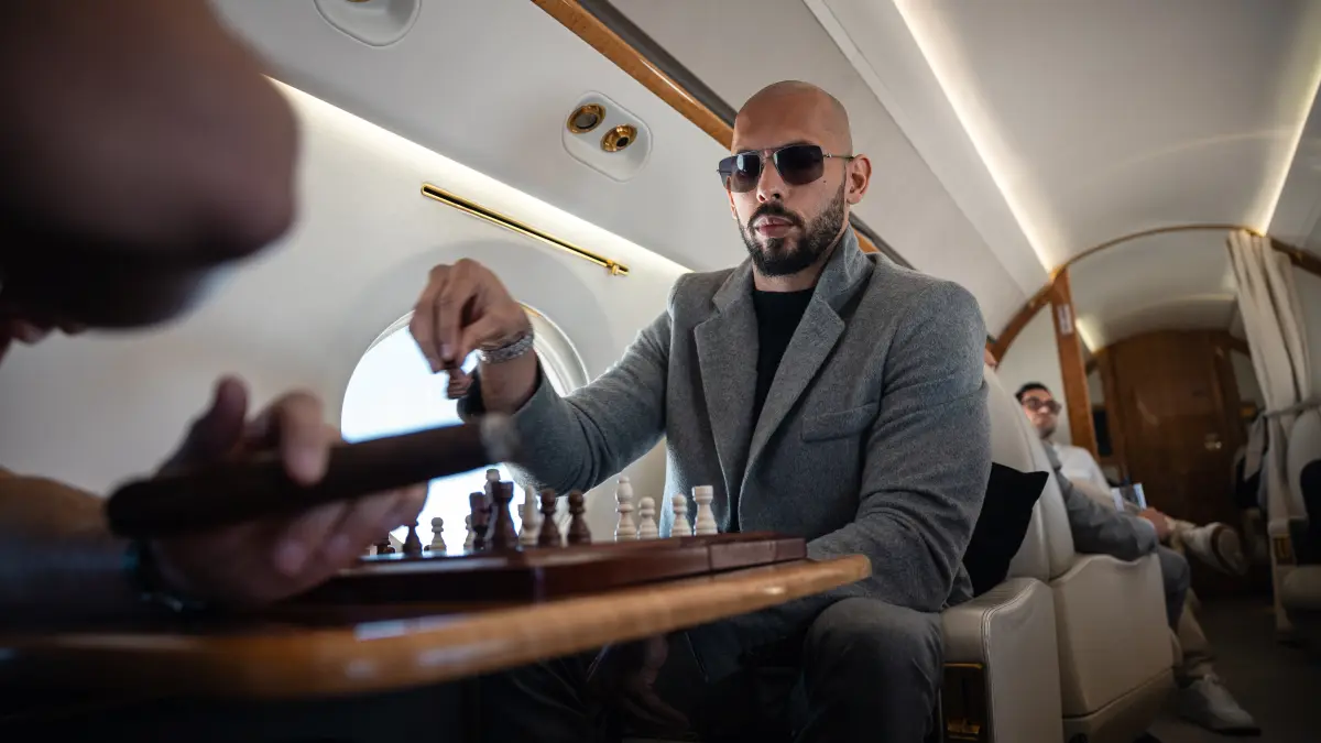 andrew tate playing chess on private jet